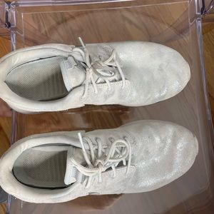 Nike metallic silver fabric run small